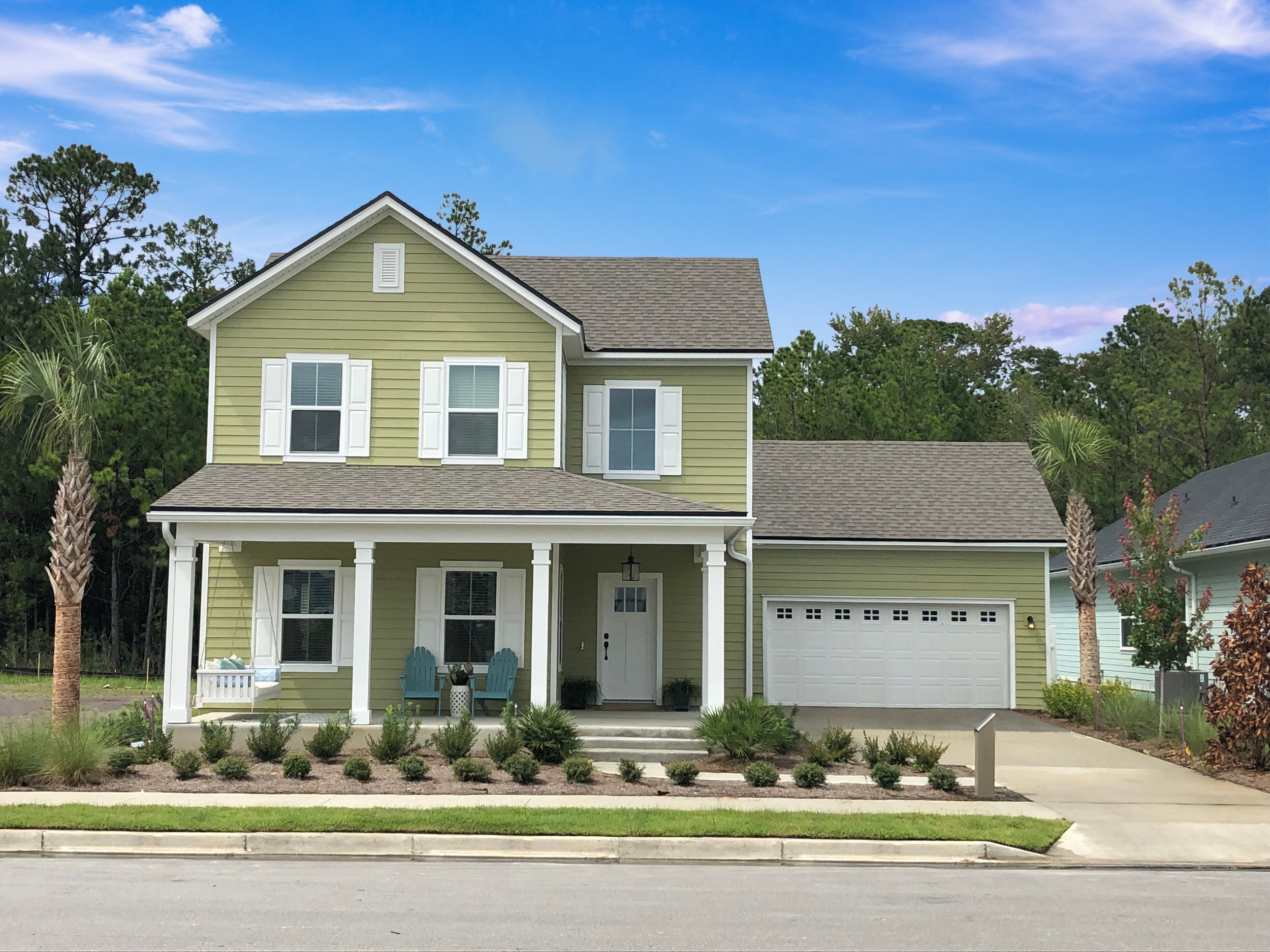 Streetview of a green home.